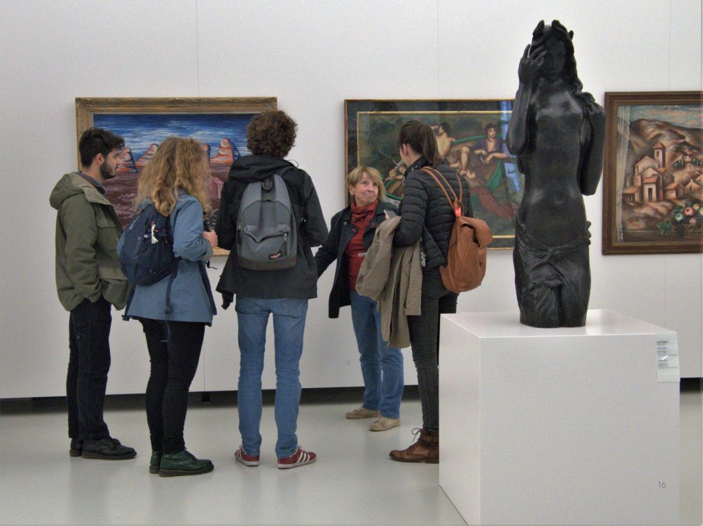 Group of students visiting a museum
